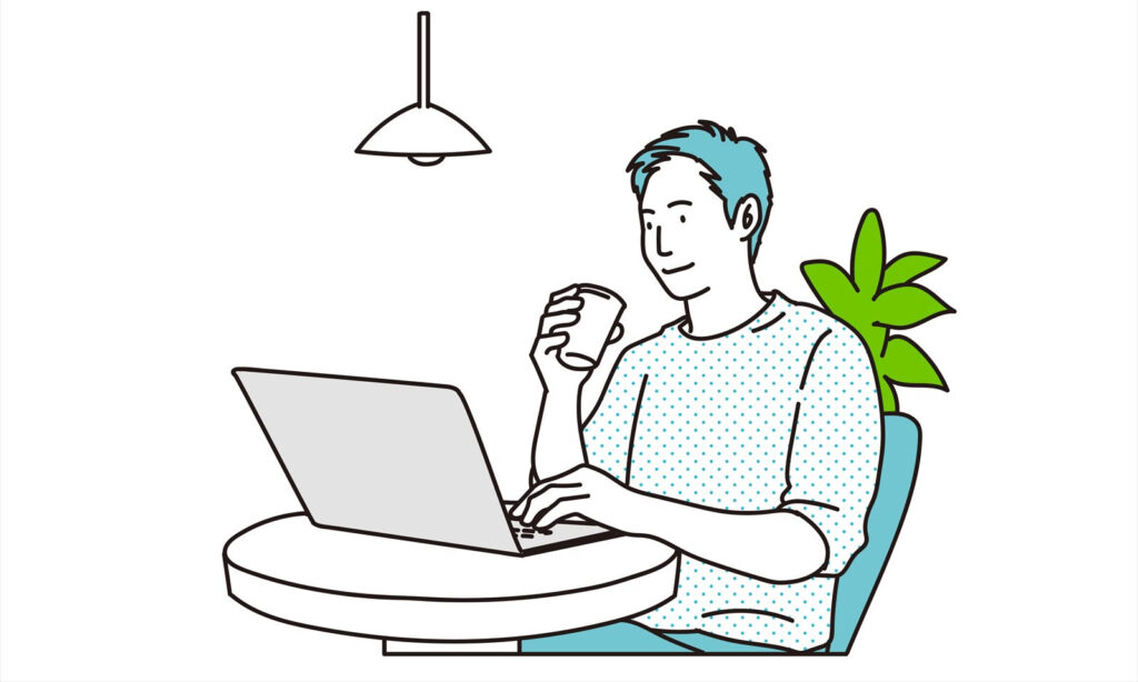 コーヒーを飲みながらネットサーフィンをする男性